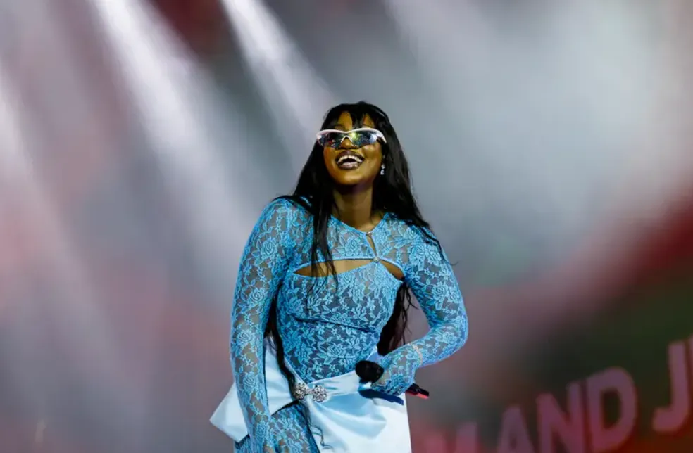 Tems Age – Exploring the Life, Music, and Rise of Nigeria’s Soulful Star
Tems, one of Nigeria’s brightest musical exports, has taken the global stage by storm with her soulful voice and emotionally charged lyrics. Born as Temilade Openiyi, she has quickly become a household name across continents. From chart-topping collaborations with global icons like Wizkid, Drake, and Beyoncé to her own Grammy-winning journey, Tems represents the new wave of African excellence in music.
As of 2025, Tems' age is 29, yet her achievements far surpass her years. Her unique blend of Afrobeats, R&B, and soul has positioned her as one of the most influential female artists of her generation. Fans often search for more than just her music — they want to know about her background, lifestyle, and the story behind hits like “Higher” and “Burning.”
In this article, we delve into Tems' biography, early life, career milestones, and personal experiences that have shaped her journey. We'll also explore her net worth, luxurious lifestyle, fun facts, and prospects, providing you with a comprehensive picture of the woman behind the voice that has captivated millions.
Who Is Tems
Tems, whose real name is Temilade Openiyi, is a Nigerian singer, songwriter, and record producer. Born on June 11, 1995, in Lagos, Nigeria, she gained recognition for her distinctive sound, which fuses contemporary R&B with African rhythms. Her breakthrough came in 2019 with the hit single “Try Me,” which showcased her raw vocal power and emotional depth.
She rose to international prominence after collaborating with Wizkid on the song “Essence”, which became a global hit and even earned a Grammy nomination. Since then, Tems has collaborated with Drake, Future, and Beyoncé, and won a Grammy Award in 2023 for Best Melodic Rap Performance for “Wait for U.”
Tems' artistry is characterized by her introspective lyrics and ethereal soundscapes, which often reflect themes of empowerment, freedom, and love. Beyond music, she's admired for her authenticity, confidence, and effortless fashion sense.
Tems WikiBio Table
Attribute	Details
Full Name	Temilade Openiyi
Stage Name	Tems
Date of Birth	June 11, 1995
Age (2025)	29 years old
Birthplace	Lagos, Nigeria
Nationality	Nigerian
Ethnicity	Yoruba
Family	Raised by a single mother, has one sibling
Career	Singer, Songwriter, Record Producer
Net Worth (2025)	$3 million (estimated)
Height	5 ft 5 in (165 cm)
Weight	60 kg (132 lbs)
Eye Color	Dark Brown
Hair Color	Black
Body Type	Curvy and Athletic
Relationship Status	Reportedly single
Genres	Afrobeats, R&B, Soul
Famous Songs	“Try Me,” “Higher,” “Free Mind,” “Burning,” “Essence”
Awards	Grammy Award, BET Award, NAACP Image Award
Early Life and Background
Tems was born in Lagos, Nigeria, and spent part of her childhood in the United Kingdom before returning to Nigeria. Her parents separated when she was young, and she was raised primarily by her mother.
Growing up, Tems was surrounded by music — from listening to Beyoncé, Lauryn Hill, and Asa, to experimenting with her own voice at a young age. Her passion for music developed during her teenage years, and she often spent hours writing lyrics and producing beats in her room.
Key Points
•	Education Attended Dowen College and later the University of Lagos, where she studied Economics.
•	Musical Influence Inspired by artists like Lauryn Hill, Amy Winehouse, and Fela Kuti.
•	Early Career Started producing her own music in her late teens using free software and recording equipment.
•	Faith & Spirituality Credits her deep faith and spirituality for helping her navigate fame and challenges.
Personal Life and Relationships
Despite her fame, Tems remains a very private person. She’s known for keeping her personal relationships away from the spotlight and focusing primarily on her career.
Key Points
•	Relationship Status As of 2025, Tems is reportedly single and not publicly linked with anyone.
•	Privacy She has expressed that her music is her form of vulnerability, allowing fans to connect emotionally without needing to know her personal affairs.
•	Family Bond Tems shares a close bond with her mother, who has been her pillar of strength.
•	Self-Expression Prefers authenticity over societal expectations — reflected in her bold fashion choices and lyrics.
Tems’ personality exudes calm confidence, which resonates deeply with her fans worldwide. Her emotional maturity and self-awareness make her not just an artist but also a role model for young women across Africa.
Career and Achievements
Tems’ career has been a meteoric rise marked by groundbreaking achievements and international recognition.
Career Highlights
•	2018 Released her debut single “Mr Rebel”, which introduced her soulful, alternative sound.
•	2019 Gained widespread fame with “Try Me.”
•	2020 Featured on Wizkid’s “Essence” — the global hit that earned a Grammy nomination.
•	2021 Released her debut EP “For Broken Ears.”
•	2022 Collaborated with Future and Drake on “Wait for U”, which won a Grammy.
•	2023 Featured on Beyoncé’s “Move” from the Renaissance album.
•	2024-2025 Continues touring globally, performing at top festivals and headlining her own concerts.
Tems’ artistry continues to evolve as she experiments with new sounds while staying rooted in her African heritage.
Net Worth Overview
Tems’ financial success mirrors her musical achievements. As of 2025, her net worth is estimated to be around $3 million.
Year	Estimated Net Worth	Source of Income
2020	$500,000	Music sales, local performances
2021	$1 million	International recognition, brand endorsements
2022	$2 million	Collaborations, streaming royalties
2023	$2.5 million	Grammy win, world tours
2024	$2.8 million	Global sponsorships, concert revenue
2025	$3 million	Streaming platforms, brand deals
Her rise in wealth demonstrates how her talent, global appeal, and authenticity have made her one of Africa’s most bankable artists.
Major Sources of Income
Tems’ diverse revenue streams reflect her multifaceted career.
•	Music Streaming Income from platforms like Spotify, Apple Music, and YouTube.
•	Live Concerts Sold-out tours across Africa, Europe, and North America.
•	Brand Endorsements Collaborations with fashion and beauty brands.
•	Songwriting Royalties Royalties from collaborations with major artists.
•	Merchandise Sales Exclusive clothing and accessories from her brand line.
•	YouTube Channel Monetized content, live performances, and interviews.
Tems’ Luxurious Lifestyle
Tems lives a life that blends elegance, simplicity, and authenticity.
•	Residences Splits time between Lagos and Los Angeles.
•	Fashion Known for her bold yet minimalist fashion sense — often wearing African-inspired outfits on red carpets.
•	Cars Owns a Mercedes-Benz GLE and Range Rover Velar.
•	Travel Frequently travels for concerts and vacations across Europe and the Caribbean.
•	Health & Fitness Follows a plant-based diet and practices yoga and meditation.
Despite her fame, Tems remains grounded, often emphasizing gratitude and mindfulness in her interviews.
Hobbies and Fun Facts
Tems’ off-stage life is filled with creativity and curiosity.
•	Songwriting Passion Writes poetry and experimental music when not touring.
•	Cooking Enjoys Nigerian and Mediterranean cuisine.
•	Reading Avid reader of philosophy and spiritual literature.
•	Art & Design Loves interior design and minimalist aesthetics.
•	Favourite Artists Admires Sade, Frank Ocean, and Lauryn Hill.
•	Introverted Nature Describes herself as a calm, introspective person.
•	Charity Work Supports educational programs for African girls.
•	Fun Fact Tems produced many of her early songs using a basic laptop and no studio equipment.
•	Stage Ritual Meditates before every live performance.
•	Inspiration Behind “Higher” & “Burning” Reflects her emotional healing journey and personal growth.
Future Prospects
Tems' future looks even brighter as she continues to redefine the global music landscape.
•	Upcoming Album Expected to release her second studio album in 2025.
•	Global Tours Plans to expand her concert footprint across Asia and South America.
•	Collaborations Rumoured collaborations with artists like The Weeknd and Doja Cat.
•	Fashion Ventures Likely to launch her own sustainable fashion line.
•	Philanthropy Plans to establish a foundation supporting young African artists.
Her long-term vision is to empower women through art and create a legacy that transcends music.
Impact on Social Media
Tems has built a strong digital presence, inspiring millions worldwide.
•	Instagram Over 4 million followers sharing her music, style, and insights.
•	TwitterX Engages fans with motivational messages and updates.
•	YouTube Millions of subscribers watch live performances and music videos.
•	TikTok Viral sound trends featuring songs like “Free Mind” and “Higher.”
•	Fan Base Known as “Rebel Gang,” her fans promote self-love and individuality.
Her genuine connection with followers and consistent engagement make her one of Africa’s most influential digital icons.
Frequently Asked Questions (FAQs)
1. How old is Tems
Tems is 29 years old as of 2025.
2. Where is Tems from
Tems is from Lagos, Nigeria.
3. What is Tems’ real name
Her real name is Temilade Openiyi.
4. What is Tems’ most popular song
Her most recognized song is “Essence” with Wizkid, followed by “Free Mind” and “Higher.”
5. What is Tems’ net worth
As of 2025, Tems' estimated net worth is $3 million.
6. Is Tems in a relationship
No, Tems is currently single and focuses on her career.
Conclusion
Tems’ age may suggest youth, but her impact on the global music scene is monumental. From humble beginnings in Lagos to Grammy-winning heights, she has proven that passion, authenticity, and hard work can transcend borders. Her songs — “Higher,” “Burning,” and “Essence” — resonate with emotion, inspiring millions worldwide.
As Tems continues to evolve, her journey stands as a beacon of empowerment for young artists across Africa. She’s not just a singer; she’s a movement — and the world is listening.

